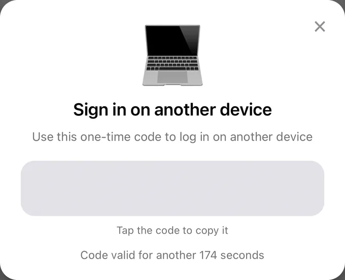 The Sign in on another device window with a one-time code